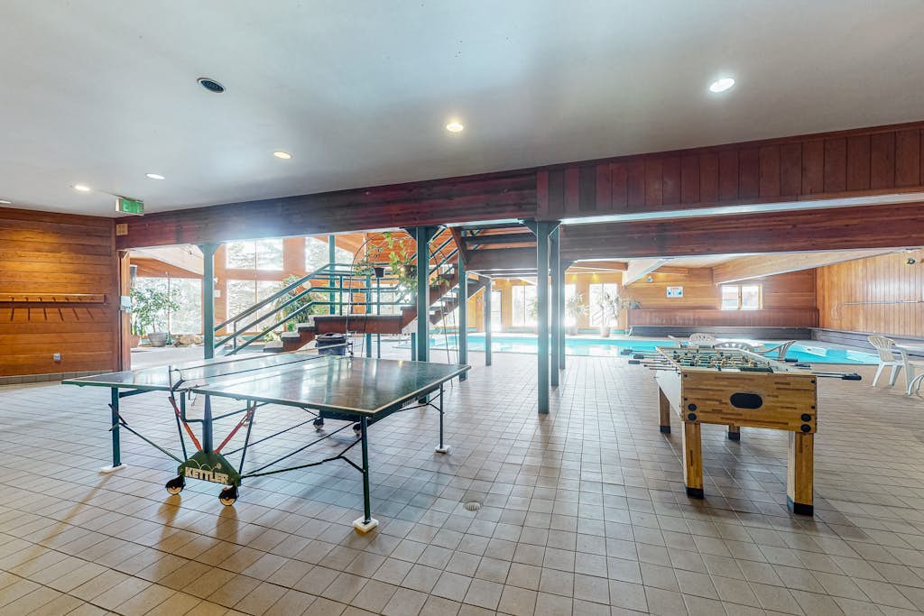 Luxurious top-floor condo with balcony, WiFi, fireplace, great views, & location