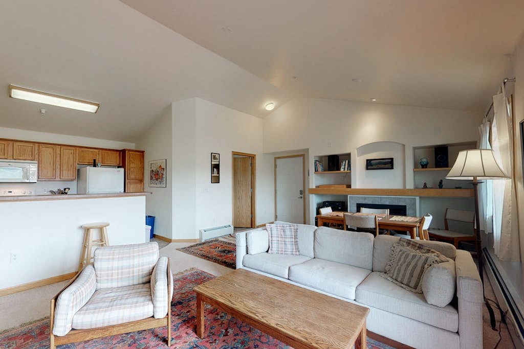 Mountain view condo with two balconies & gas fireplace - close to lifts