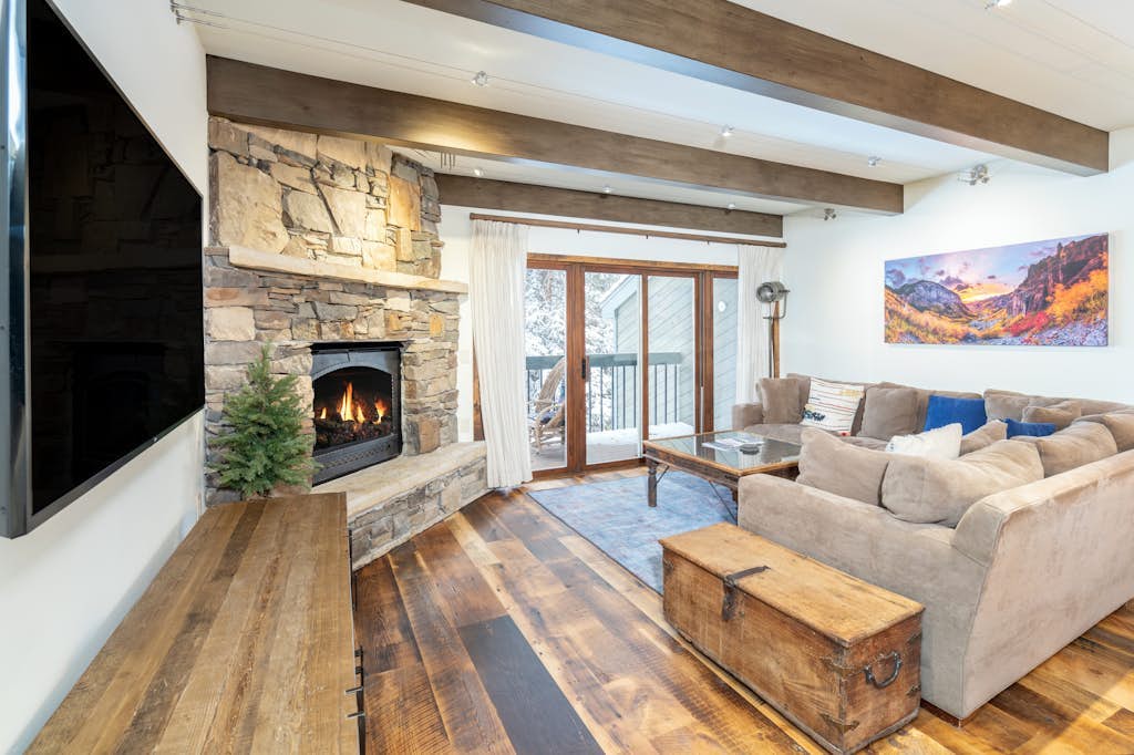 Mountain- & river-view condo with W/D & hot tub - walk to lifts & Main St