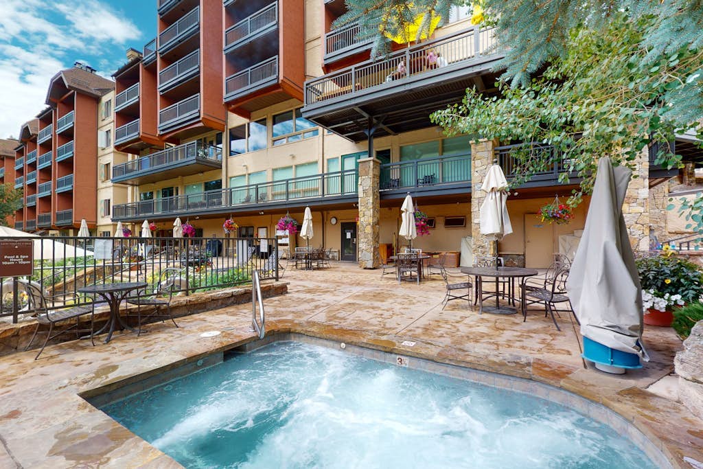 Ski-in/out condo w/ mountain view, fireplace, fast WiFi, shared pool/hot tub/WD
