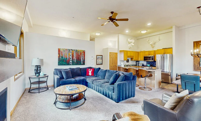 Mtn-view condo next to lifts with heated outdoor pool, hot tub, sauna, fireplace