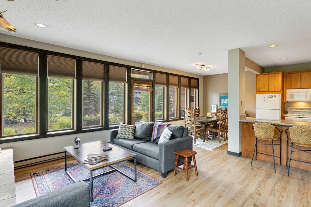 Sunlit, mountain view condo with a fireplace plus on-site pool & hot tub