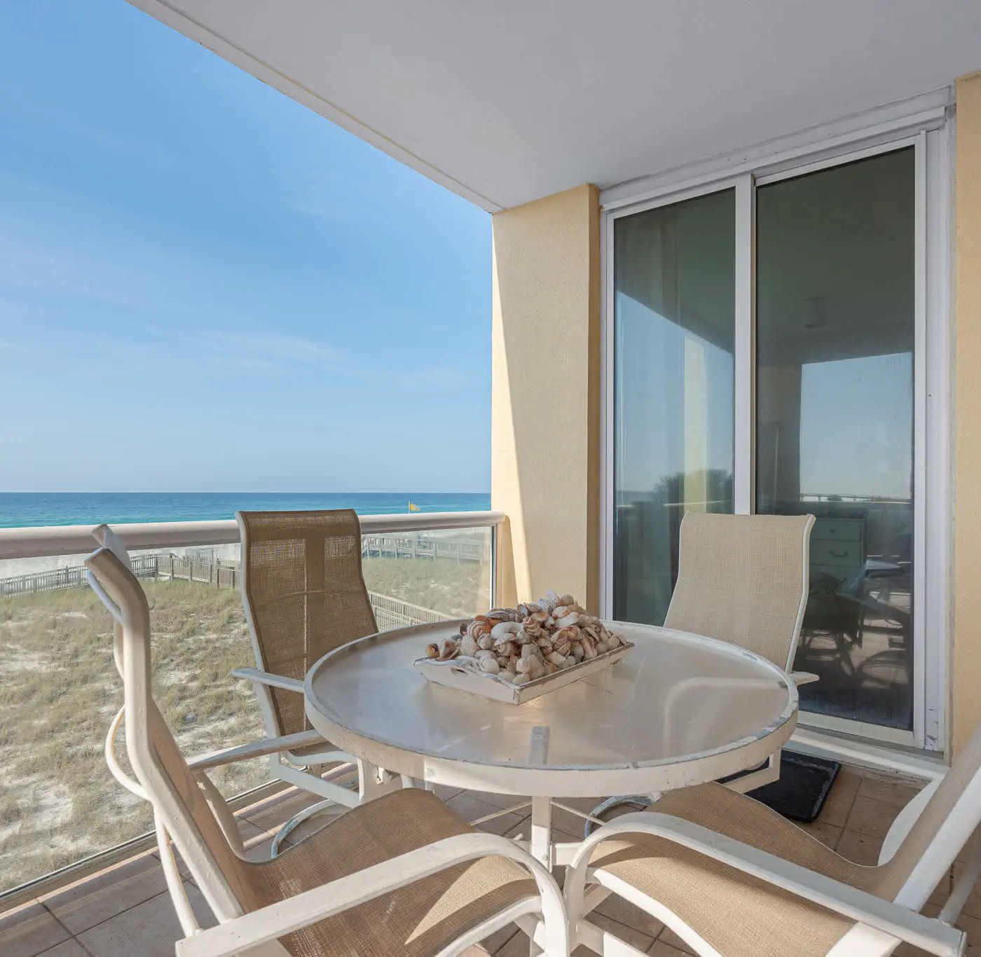 Sunny Beachfront condo with Gulf views, pool & deck
