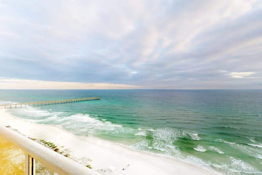 Sunny Beachfront condo with Gulf views, pool & deck