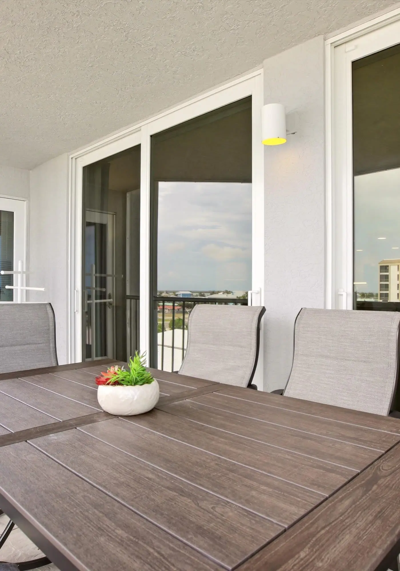 Beachfront Bliss, Cozy Condo with Patio, Pool & Stunning Views!