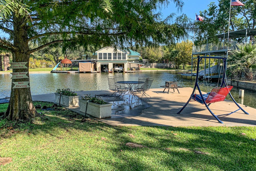 Charming dog-friendly lakefront home with lake view, dock, & washer/dryer