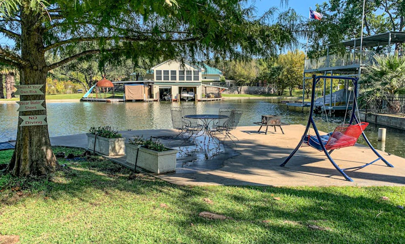 Charming dog-friendly lakefront home with lake view, dock, & washer/dryer