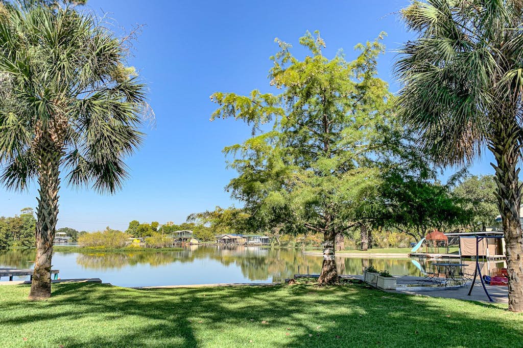 Charming dog-friendly lakefront home with lake view, dock, & washer/dryer