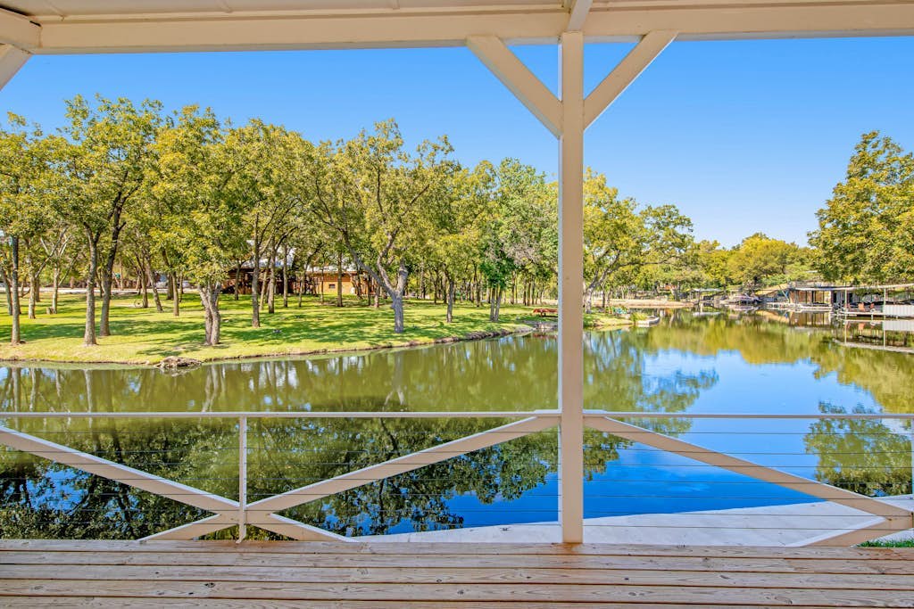 Lakefront dog-friendly home with kayaks, SUP's, huge screened porch