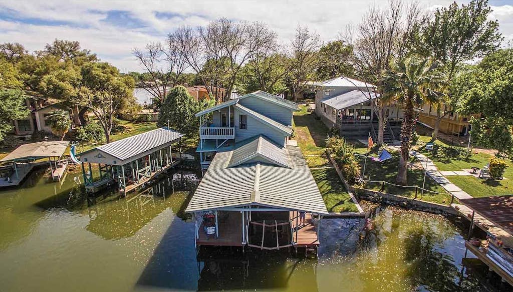 Lakefront home on water with great views, boat dock, al fresco dining, and WiFi