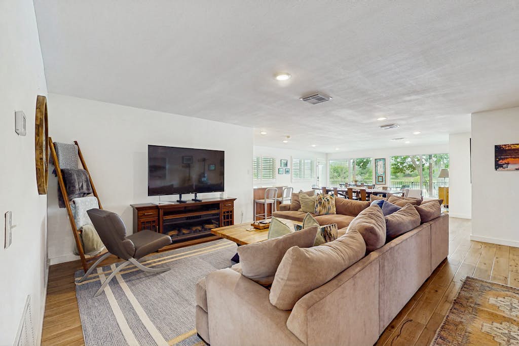 Waterfront home w/kayaks, game room, firepit, & enormous deck