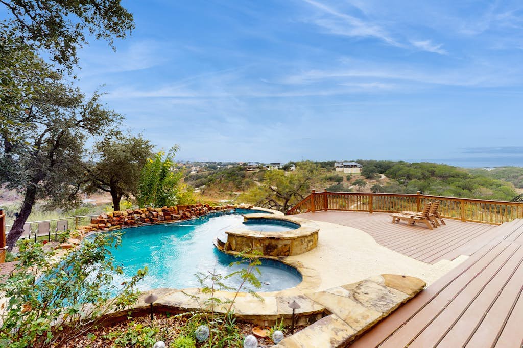 Waterfront home with private pool, patio & amazing sunset view