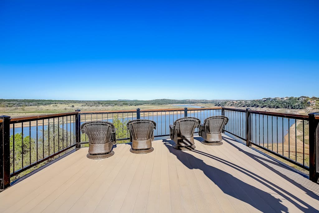 Stunning lakefront home with 2 patios, chef's kitchen, & lake access
