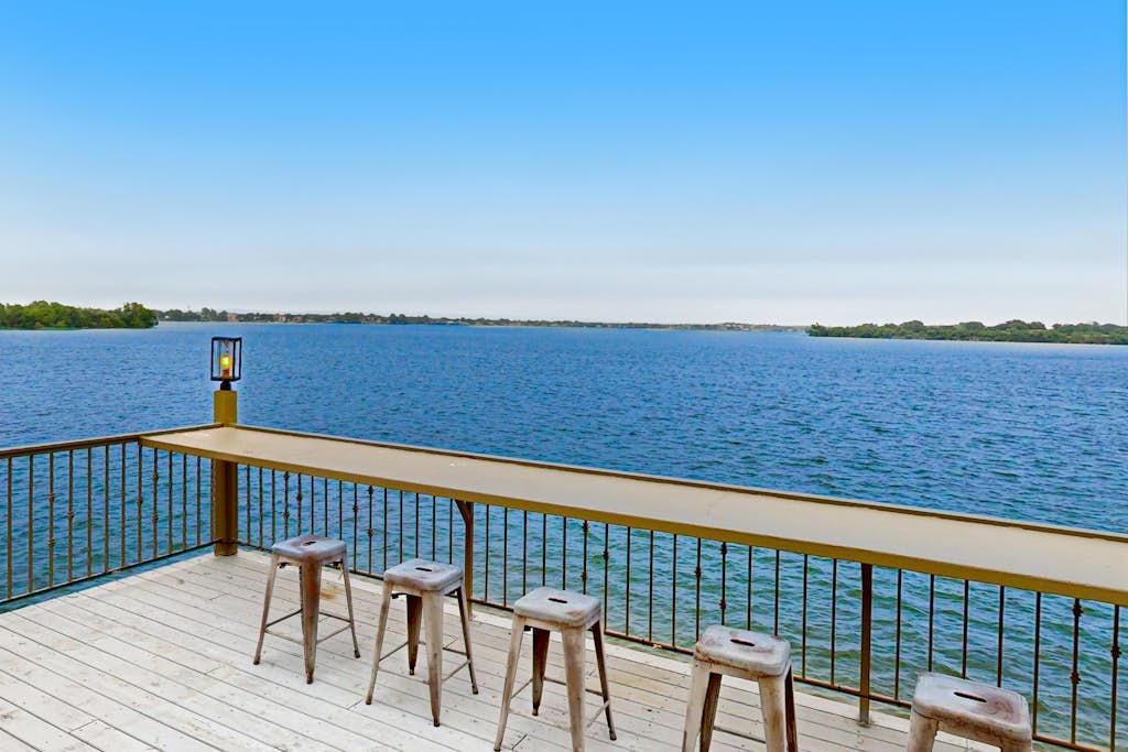 Luxe lakefront retreat with private pool, spa, lakeside terrace, gourmet kitchen