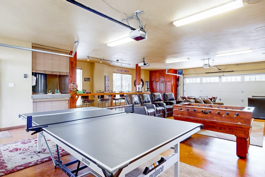 Waterfront home with game room, decks, pool, smart TVs, kayaks, & gas grill