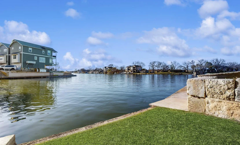 Stunning lakefront home w/ pickleball, shared pool & sand volleyball