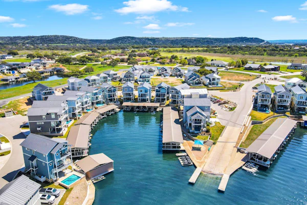 Stunning lakefront home w/ pickleball, shared pool & sand volleyball