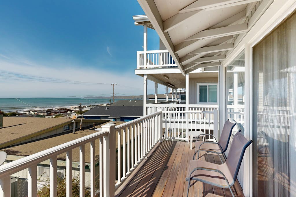 Charming, two-story home with deck, grill, and ocean views