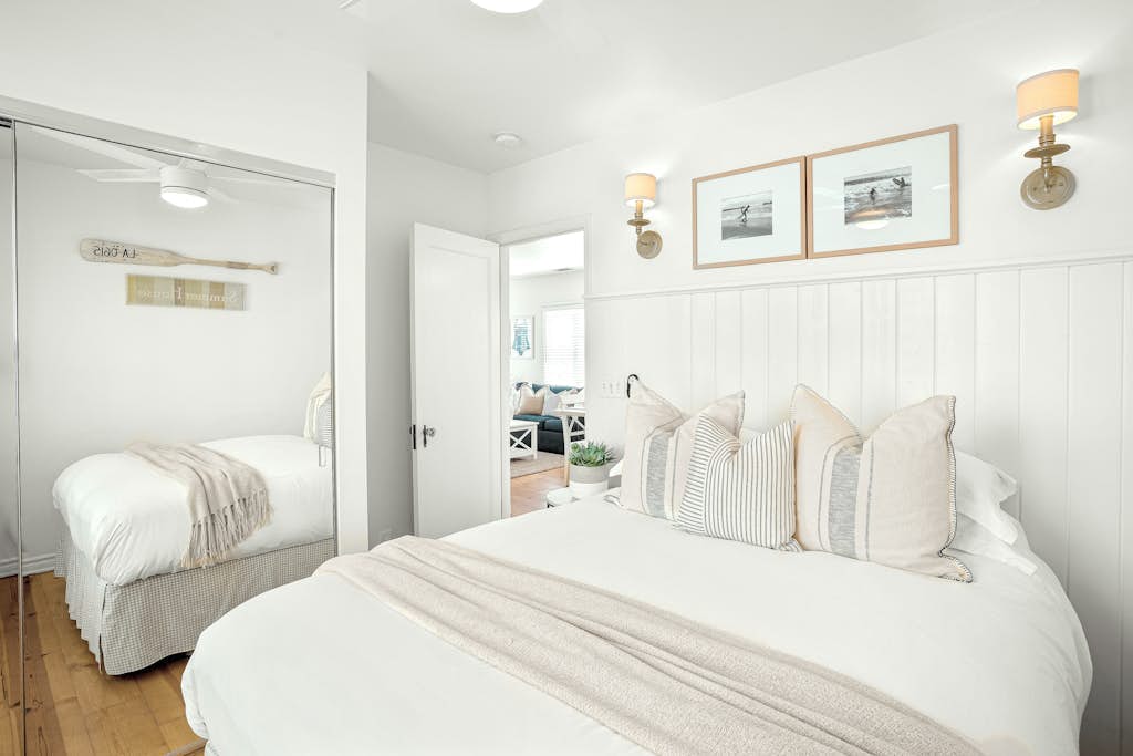 Ground-floor beach cottage with a furnished patio, AC, parking, & washer/dryer