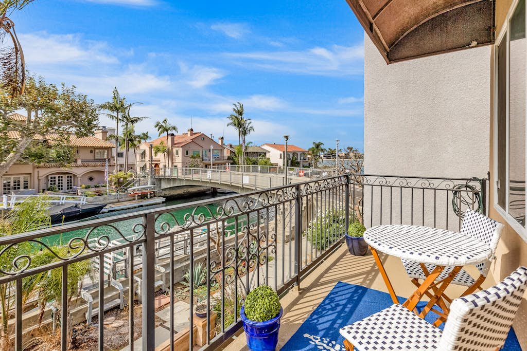 Bright home on the channel with expansive patio & elevator