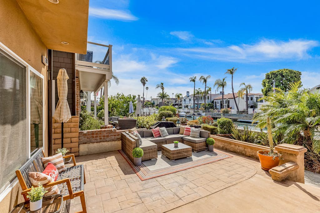 Bright home on the channel with expansive patio & elevator