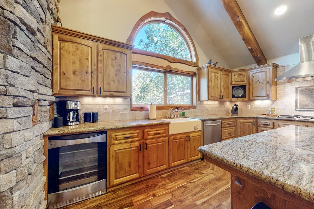 Private alpine hideaway with fireplaces, furnished deck, & designer kitchen - dog-friendly
