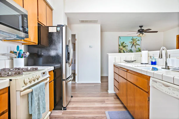 2-story centrally located home with grill, patio, fireplace, streaming, & W/D