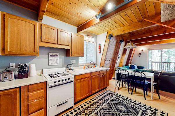 Dog-friendly 2-story home with large deck, tree views, fireplace, & W/D
