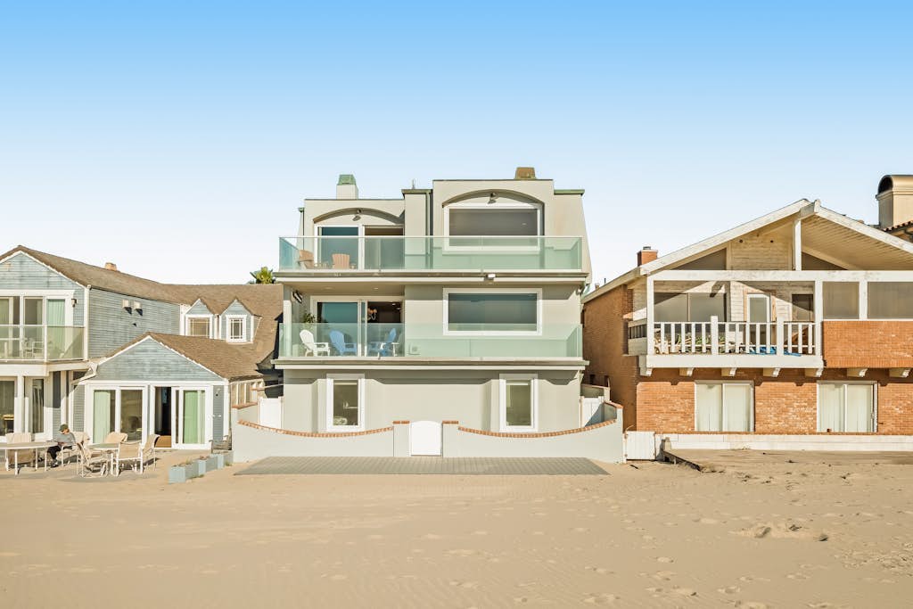 Incredible beachfront home with furnished patio, balcony & free WiFi