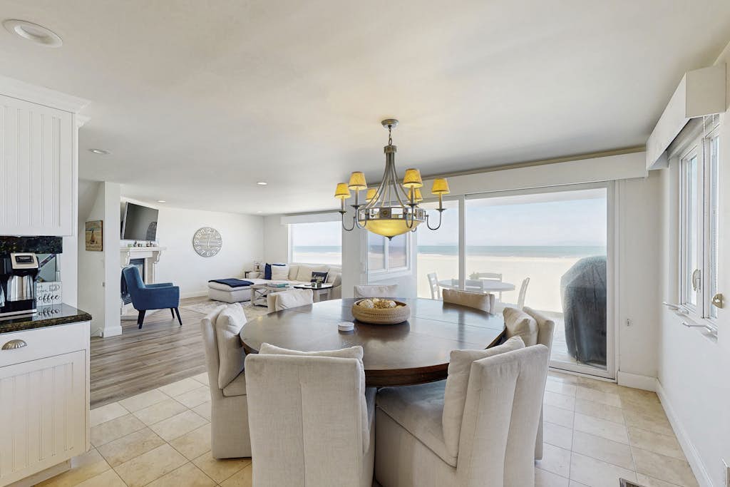 Incredible beachfront home with furnished patio, balcony & free WiFi