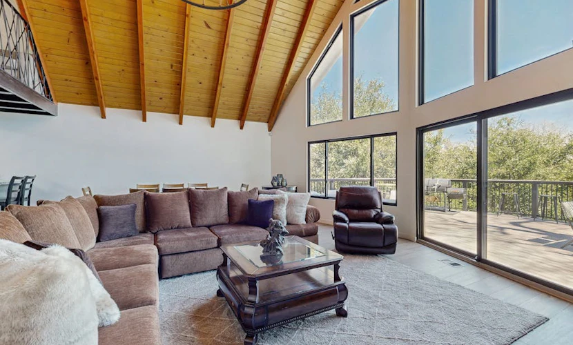 Modern chalet w/expansive deck, gas grill, & game room - close to lake & town