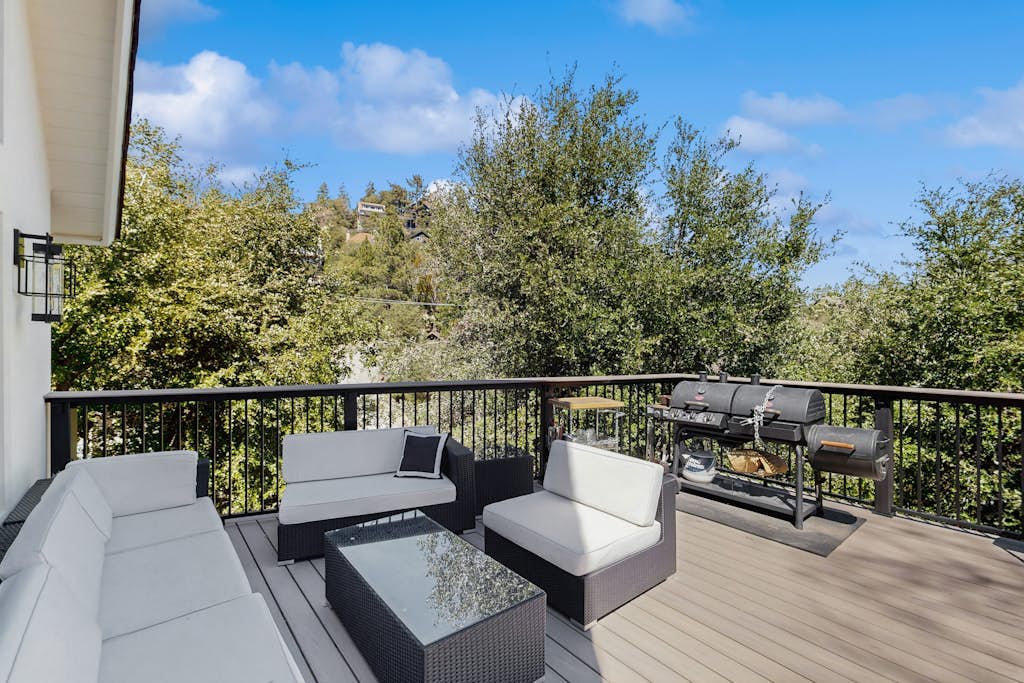 Modern chalet w/expansive deck, gas grill, & game room - close to lake & town