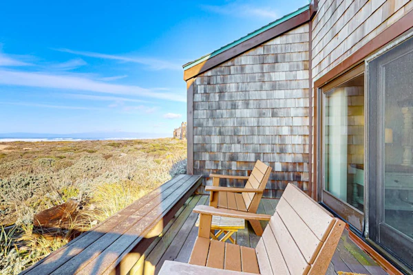 Stunning ocean-view home with W/D, sauna, tennis court, & patio - beach access