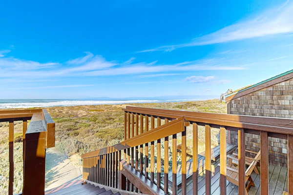 Stunning ocean-view home with W/D, sauna, tennis court, & patio - beach access
