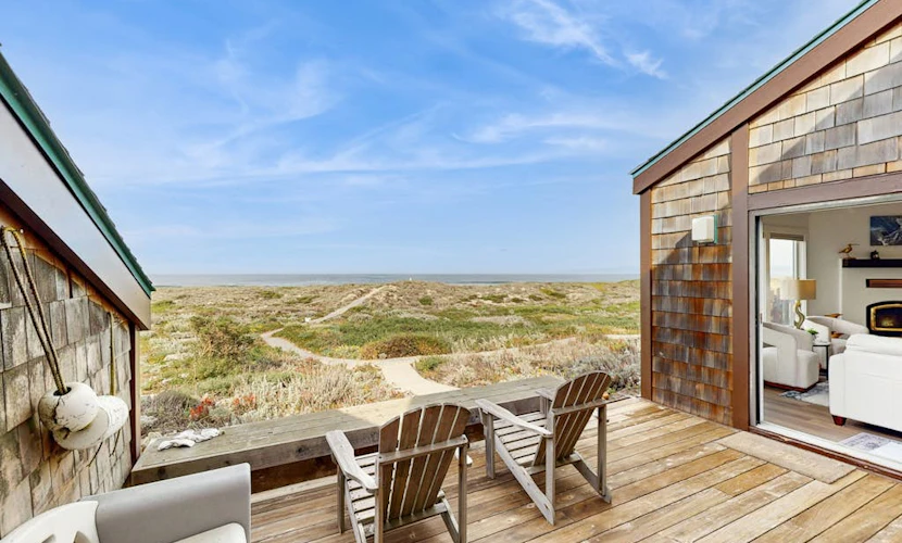 Beachfront condo with private patio, beach access, shared pool & hot tub.
