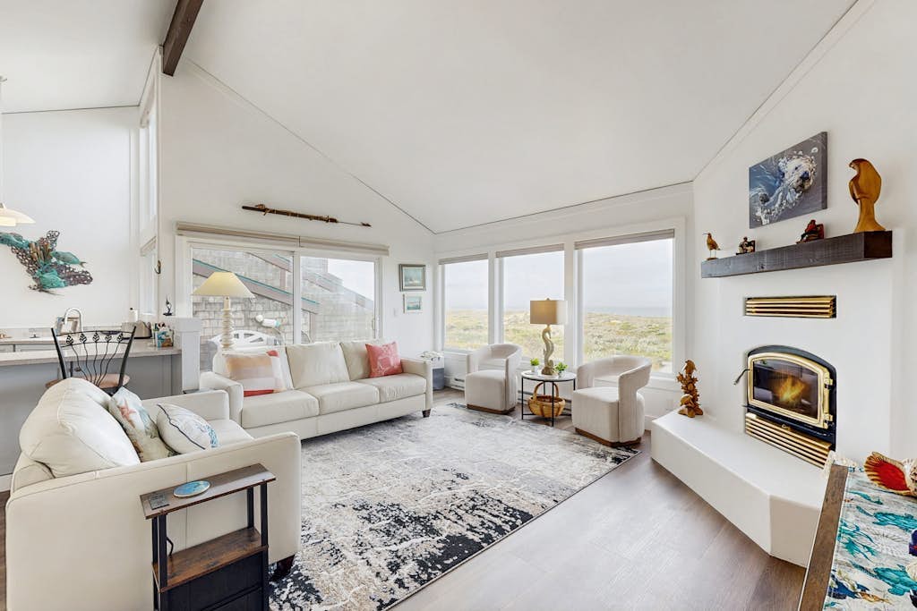 Beachfront condo with private patio, beach access, shared pool & hot tub.