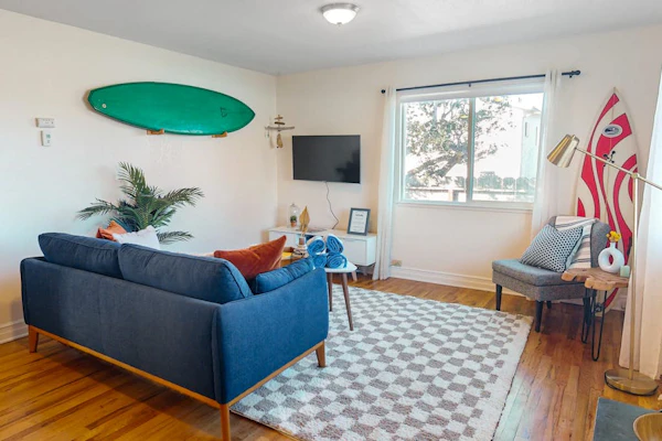 Ocean-view home in great location with backyard deck, grill, streaming, & W/D