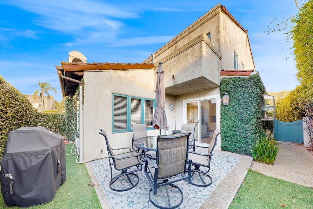 Lovely home with furnished patio, grill & ocean views - close to the beach
