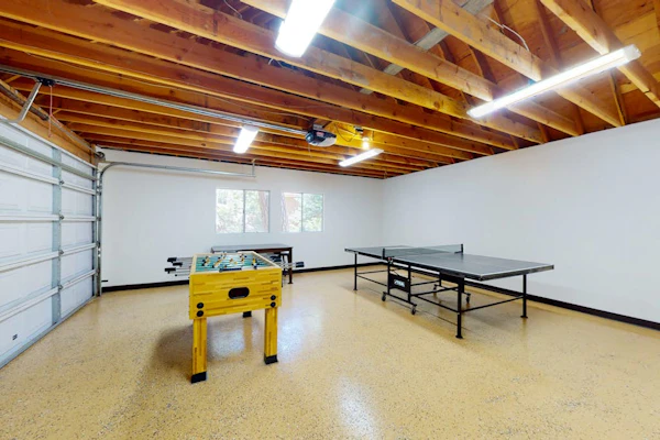 Serene lakefront getaway with game room, fireplace, & washer/dryer