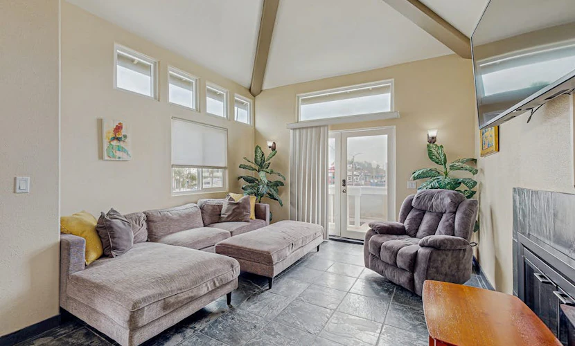 Two-story duplex near the beach with gas grill, balcony, great views, & WiFi