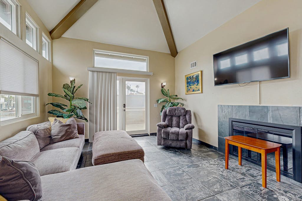 Two-story duplex near the beach with gas grill, balcony, great views, & WiFi