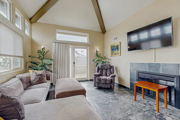 Two-story duplex near the beach with gas grill, balcony, great views, & WiFi