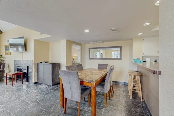 Two-story duplex near the beach with gas grill, balcony, great views, & WiFi
