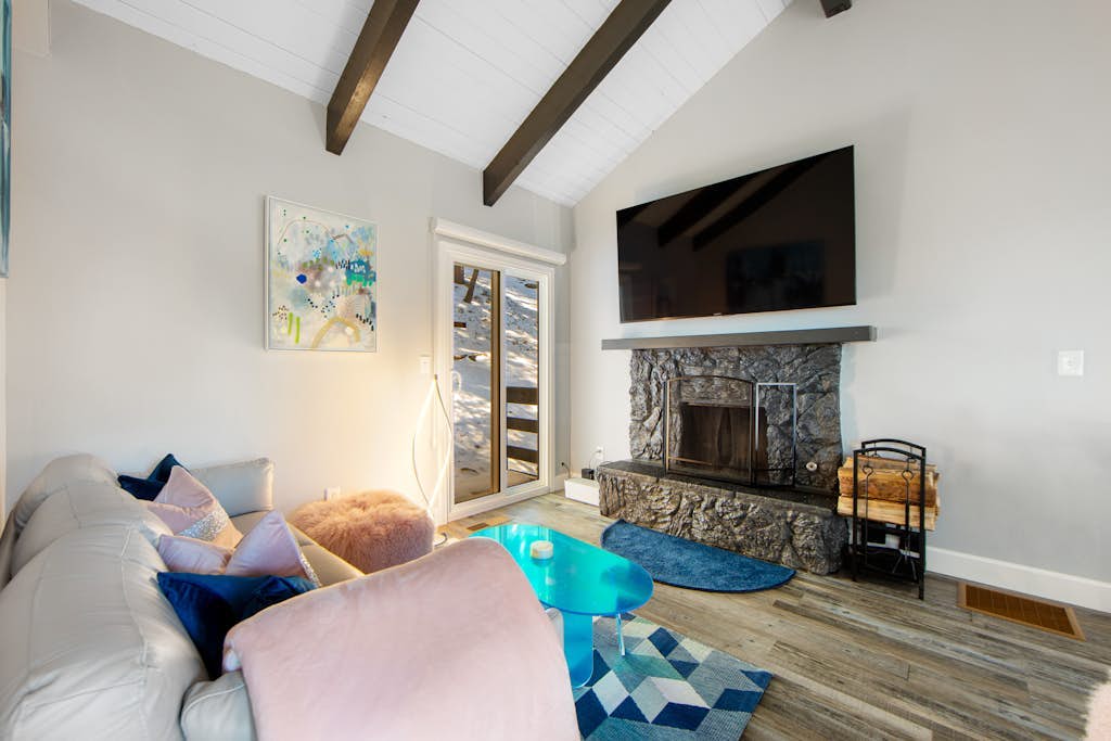 Colorful home with washer/dryer, AC & wood-burning fireplace in a lovely setting