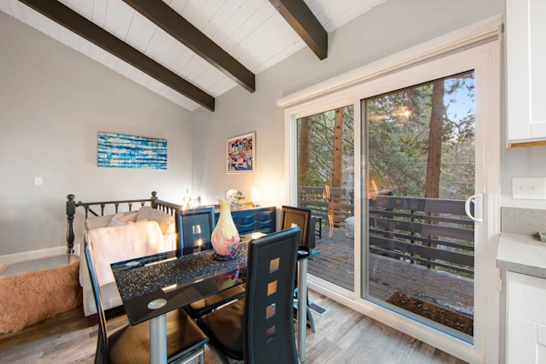 Colorful home with washer/dryer, AC & wood-burning fireplace in a lovely setting
