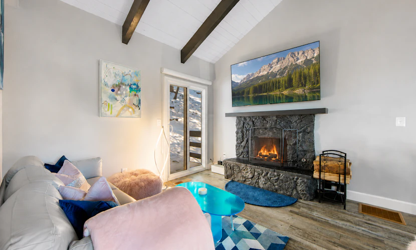 Colorful home with washer/dryer, AC & wood-burning fireplace in a lovely setting