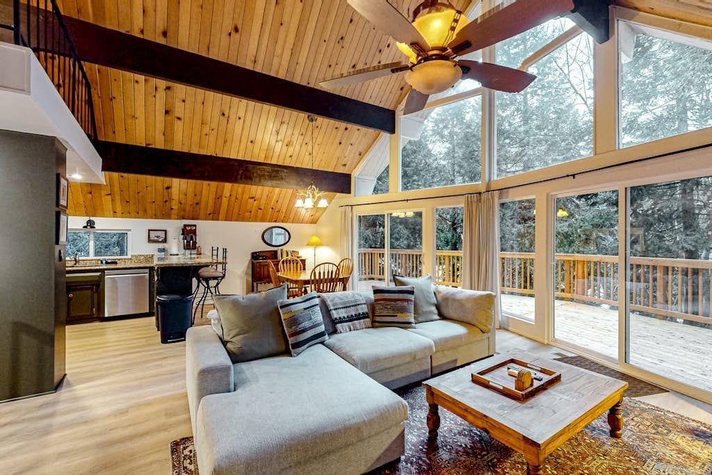 Enchanting lake retreat with fireplace, games, & great deck views - dog-friendly
