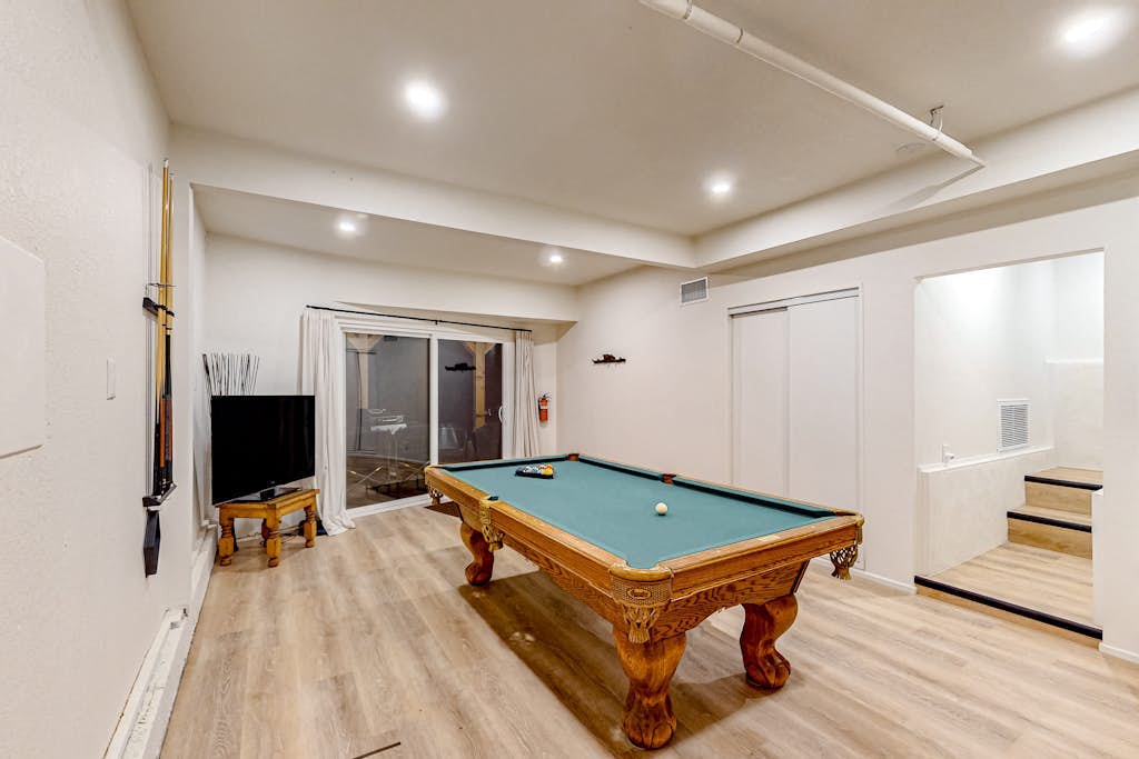 Enchanting lake retreat with fireplace, games, & great deck views - dog-friendly