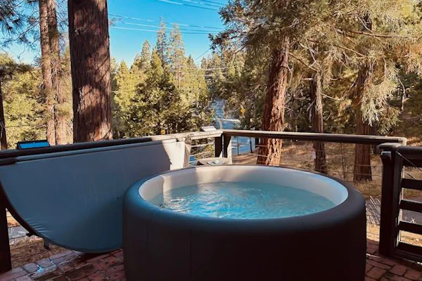 Serene cabin near Lake Arrowhead Village with wraparound deck & forest views
