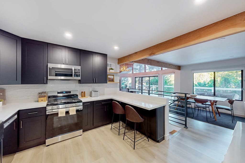 Dog-friendly home with beautiful views, large deck, smart TVs & lake access